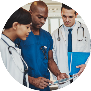 Physicians gathering and viewing a document